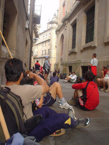 people sitting in the streets of Santiago de Compestela
