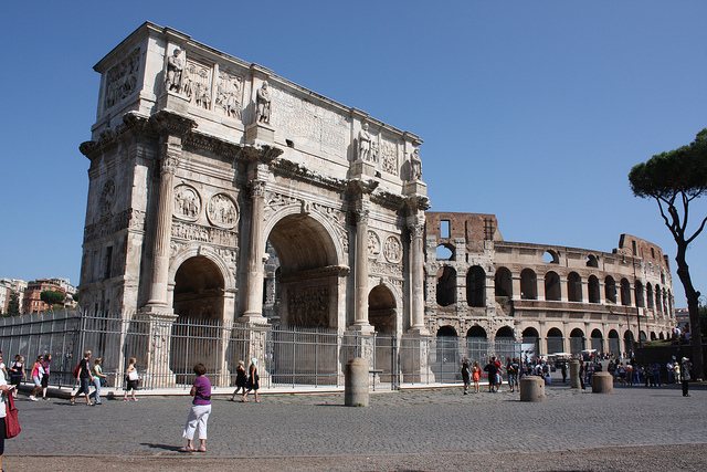 The Arch of Constantine and the Colosseum behind it in Rome are some of the top historical sites in Europe!